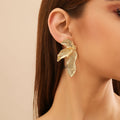 Elegant Retro Gold Color Leaves Stud Earrings for Women Design Sense Irregular Piercing Earrings Fashion Banquet Party Jewelry